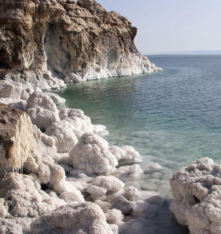 White rocks by the sea in Jordan, one of the holiday destinations you can go to with Homeric Tours.