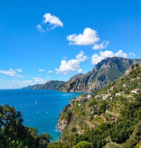View of the Amalfi Coast in Italy. Crystal clear sea and green mountains.
